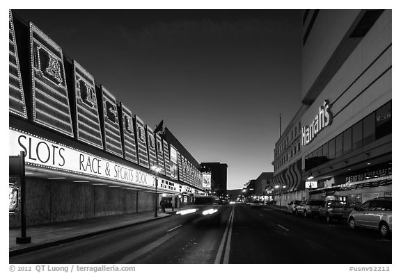 Casinos bordering street at dusk. Reno, Nevada, USA