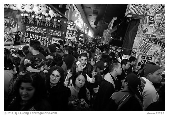 Densely packed crowds in circus arcade. Reno, Nevada, USA