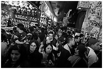 Densely packed crowds in circus arcade. Reno, Nevada, USA ( black and white)