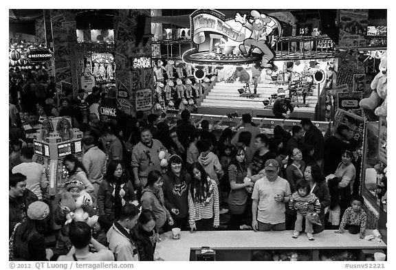 Families crowd arcade during holidays. Reno, Nevada, USA