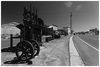 Historic mining equipement lining main street. Nevada, USA (black and white)