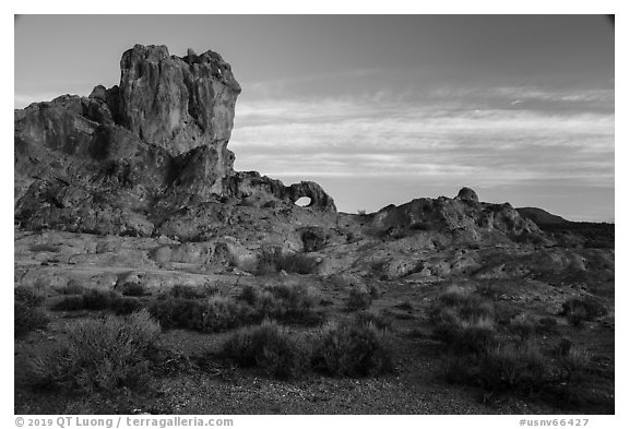Distant natural arch. Basin And Range National Monument, Nevada, USA (black and white)