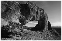 Natural arch through volcanic rock. Basin And Range National Monument, Nevada, USA ( black and white)