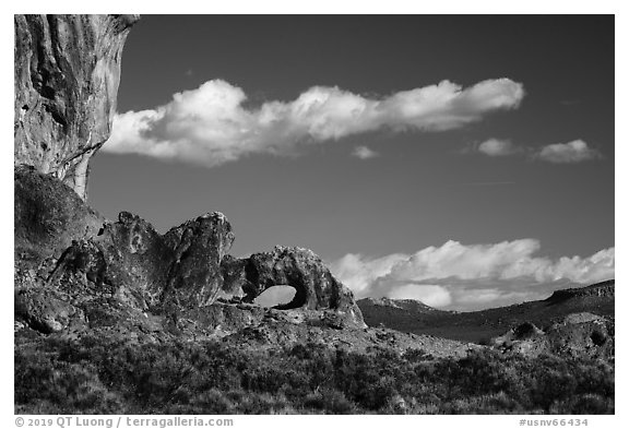 Natural arch and clouds. Basin And Range National Monument, Nevada, USA (black and white)