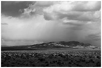 Wide valley, distant mountains, and clouds. Basin And Range National Monument, Nevada, USA ( black and white)