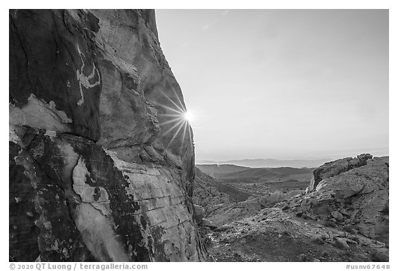 Falling Man petroglyph and sun. Gold Butte National Monument, Nevada, USA (black and white)