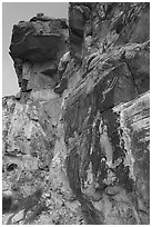 Cliff with falling Man petroglyph. Gold Butte National Monument, Nevada, USA ( black and white)