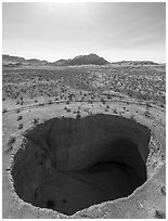 Aerial view of Devils Throat sink hole. Gold Butte National Monument, Nevada, USA ( black and white)