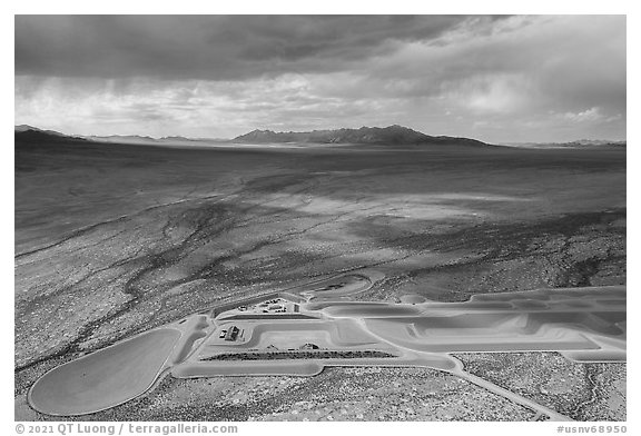 Aerial view of part of Michael Heizer's City with sun. Basin And Range National Monument, Nevada, USA