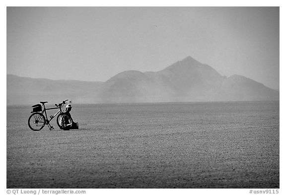 Bicyclist on the desert Playa, Black Rock Desert. Nevada, USA