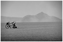 Bicyclist on the desert Playa, Black Rock Desert. Nevada, USA (black and white)