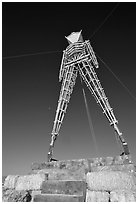 The Man, a symbolic sculpture burned at the end of the Burning Man festival, Black Rock Desert. Nevada, USA ( black and white)