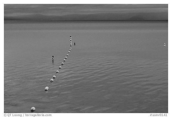 Buoy line and blue lake at dusk, South Lake Tahoe, California. USA (black and white)