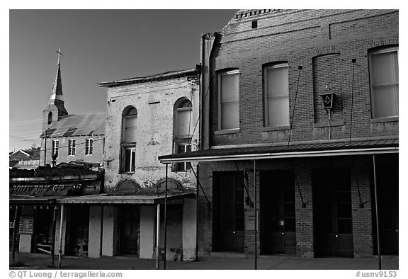 Buildings on main street and church, sunset, Austin. Nevada, USA (black and white)