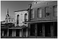 Buildings on main street and church, sunset, Austin. Nevada, USA (black and white)