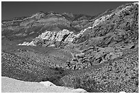 Red sandstone formations, and green hills, Red Rock Canyon. Red Rock Canyon, Nevada, USA (black and white)