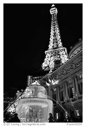 Fountain, opera house and Eiffel tower, Paris Las Vegas by night. Las Vegas, Nevada, USA