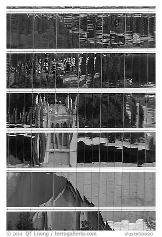 Church reflected in glass building. Houston, Texas, USA (black and white)