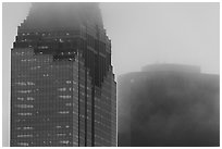 Skyscrapers reaching out for clouds at dawn. Houston, Texas, USA ( black and white)