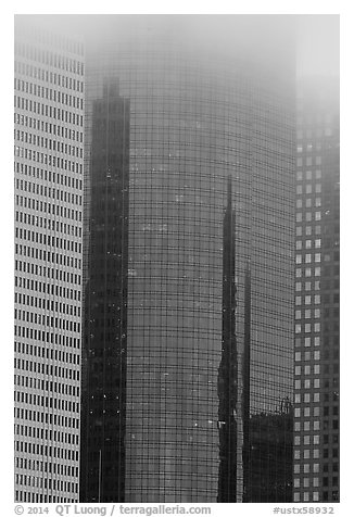 Top of skyscrapers capped by fog. Houston, Texas, USA (black and white)
