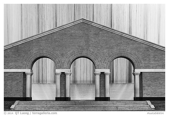 Gerald D. Hines Waterwall (Williams waterfall) at dusk. Houston, Texas, USA (black and white)