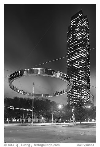 Street intersection and Williams Tower at night. Houston, Texas, USA (black and white)