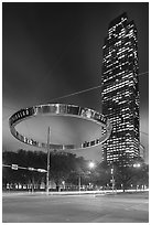 Street intersection and Williams Tower at night. Houston, Texas, USA ( black and white)