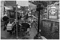 Republic of Texas restaurant on Riverwalk. San Antonio, Texas, USA ( black and white)