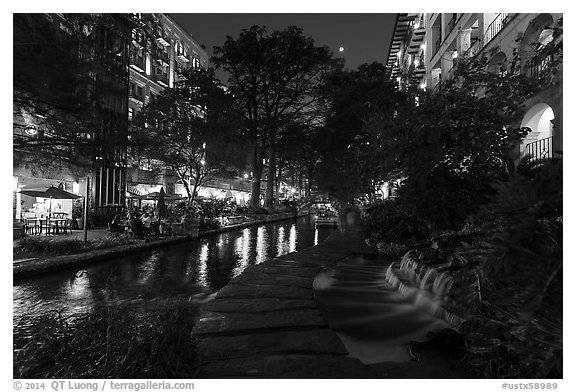 Waterfall at dusk, Riverwalk. San Antonio, Texas, USA (black and white)