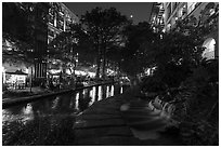 Waterfall at dusk, Riverwalk. San Antonio, Texas, USA ( black and white)