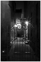 Alley next to church at night. San Antonio, Texas, USA ( black and white)