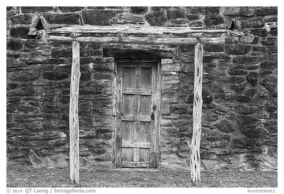 Door in wall, Indian quarters, Mission San Jose. San Antonio, Texas, USA (black and white)
