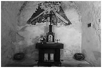Secondary altar in adobe room, Mission Concepcion. San Antonio, Texas, USA ( black and white)