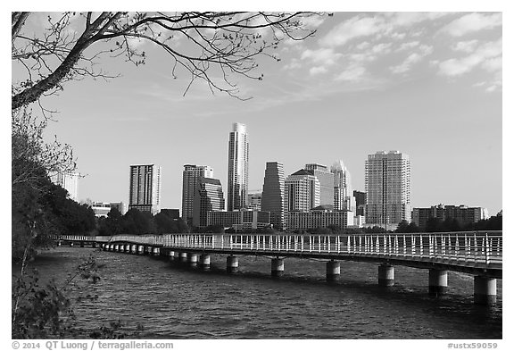 Skyline and pier over Colorado River. Austin, Texas, USA (black and white)