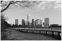 Skyline and pier over Colorado River. Austin, Texas, USA ( black and white)