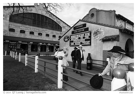 Men in front of Cowtown Coliseum. Fort Worth, Texas, USA (black and white)