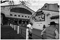 Men in front of Cowtown Coliseum. Fort Worth, Texas, USA ( black and white)