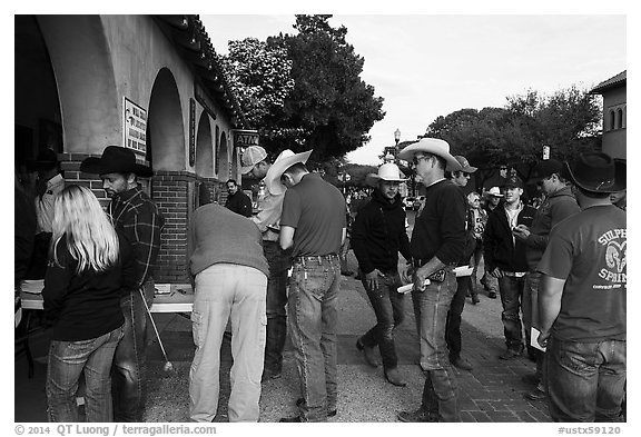 Rodeo contestants line up, Stockyards. Fort Worth, Texas, USA (black and white)