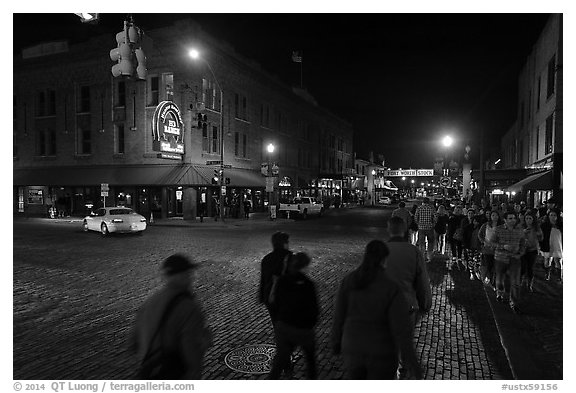 Street crossing at night, Fort Worth Stockyards. Fort Worth, Texas, USA (black and white)