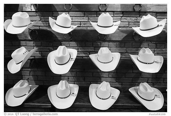 Light cowboy hats for sale. Fort Worth, Texas, USA (black and white)