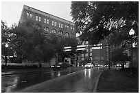 Elm Street with X marking JFK assassination spot and Texas School Book Depository,. Dallas, Texas, USA ( black and white)