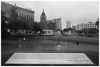 Sign commemorating JFK on assassination site. Dallas, Texas, USA ( black and white)