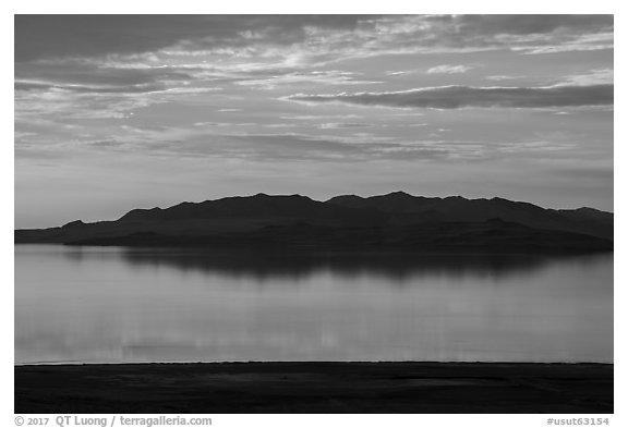 Hills reflected at sunset, Antelope Island, Great Salt Lake,. Utah, USA (black and white)