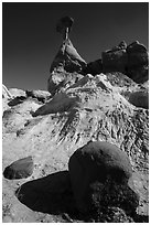 Rock and capped sandstone spire. Grand Staircase Escalante National Monument, Utah, USA ( black and white)