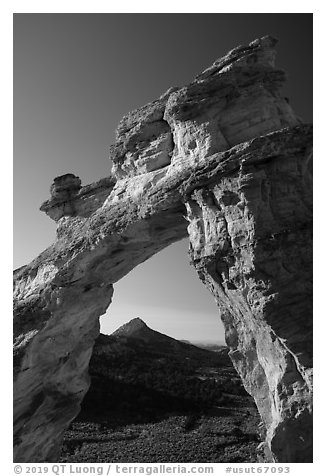 Grosvenor Arch framing peak. Grand Staircase Escalante National Monument, Utah, USA (black and white)