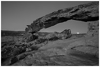 Sunset Arch with setting moon. Grand Staircase Escalante National Monument, Utah, USA ( black and white)