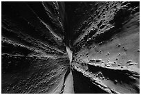 Walls textured with knobs, Spooky slot canyon. Grand Staircase Escalante National Monument, Utah, USA ( black and white)