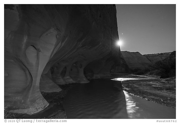 Windows of the Paria River and moon. Grand Staircase Escalante National Monument, Utah, USA