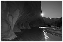 Windows of the Paria River and moon. Grand Staircase Escalante National Monument, Utah, USA ( black and white)