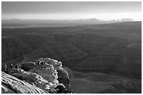 Watching the sunset over the San Juan River, Monument Valley in the background. Bears Ears National Monument, Utah, USA ( black and white)